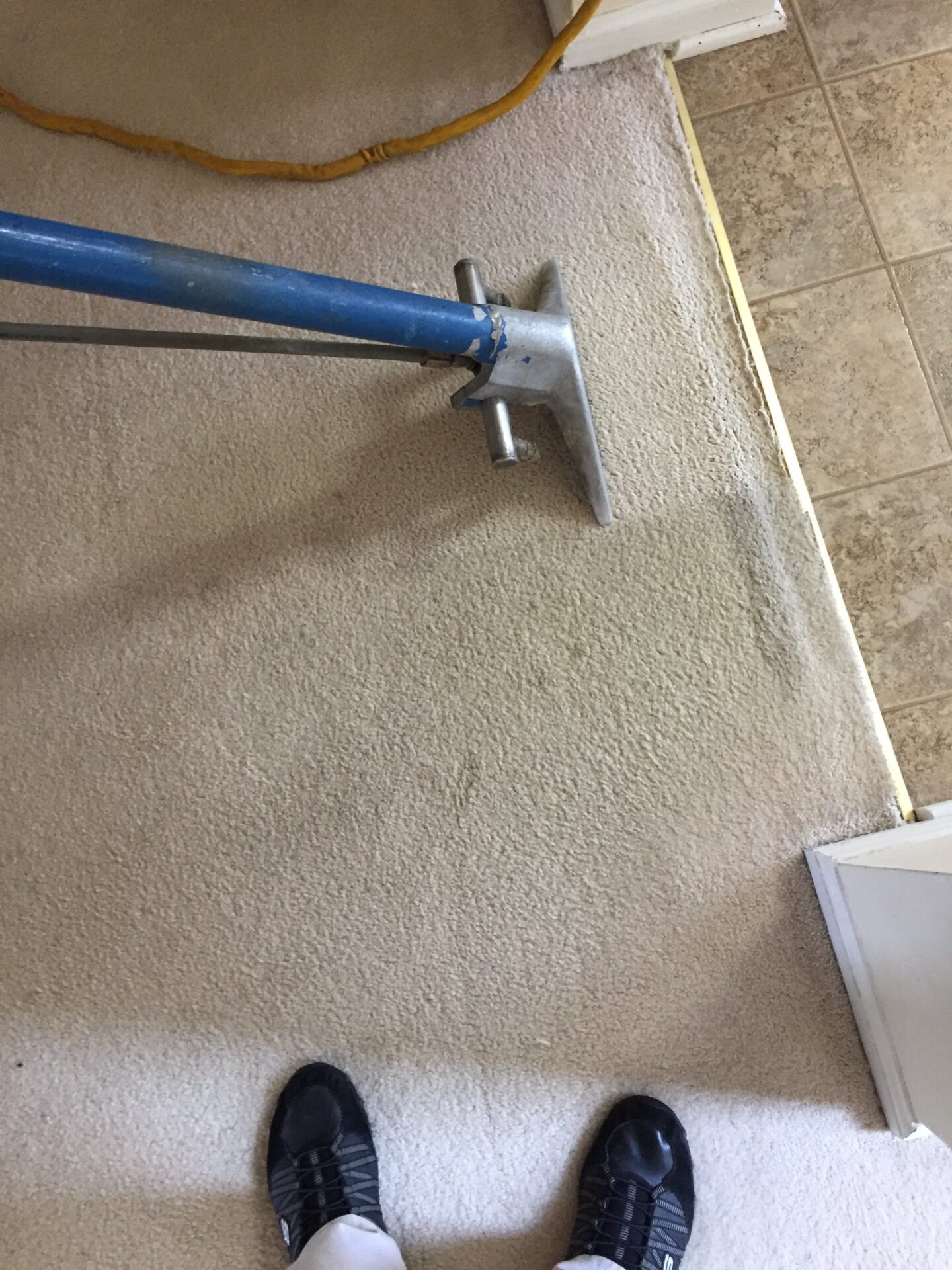 A closeup look at the vacuum cleaner cleaing the floor
